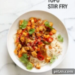 Veganuary Dash: 15 Quick 30-Minute Plant-Powered Meals 13 Sticky Ginger Sesame Tofu and Veggies in one pot, ready to be served.