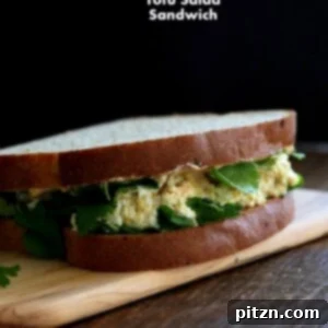 Veganuary Dash: 15 Quick 30-Minute Plant-Powered Meals 8 A simple yet delicious Tofu 'Egg' Salad Sandwich, showcasing the fluffy texture of the tofu filling.