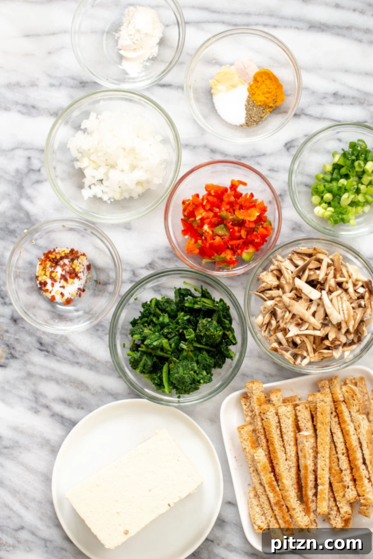 Ingredients for vegan breakfast bake A visual display of all the fresh, wholesome ingredients laid out, ready for preparing the vegan egg casserole.