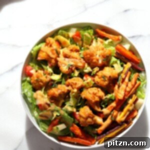 Peanut Butter Cauliflower Bowl with Roasted Carrots