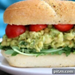 Spicy Avocado Chickpea Salad Sandwich on toasted bread