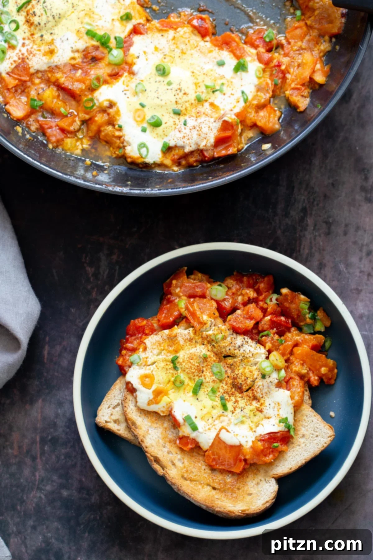 Vegan Tofu Shakshuka 3 vegan eggs in purgatory served with slices of crust bread