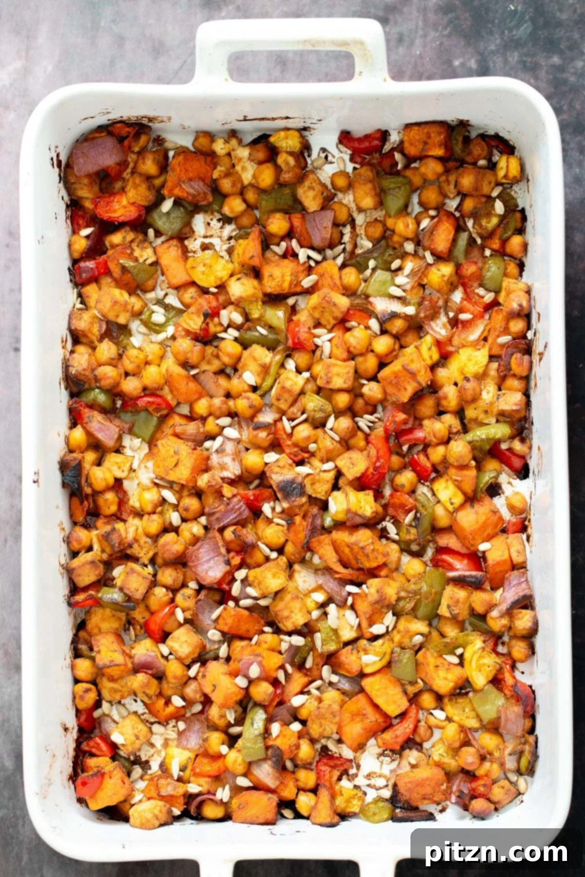 sheet pan cheeseburger Freshly baked cheeseburger sheet pan dinner baked in a casserole dish