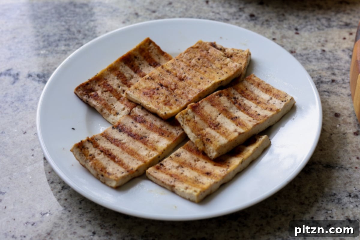 Mediterranean Grilled Veggie with Sun-Kissed Tomato & Basil Pesto 15 plate of perfectly grilled tofu slices