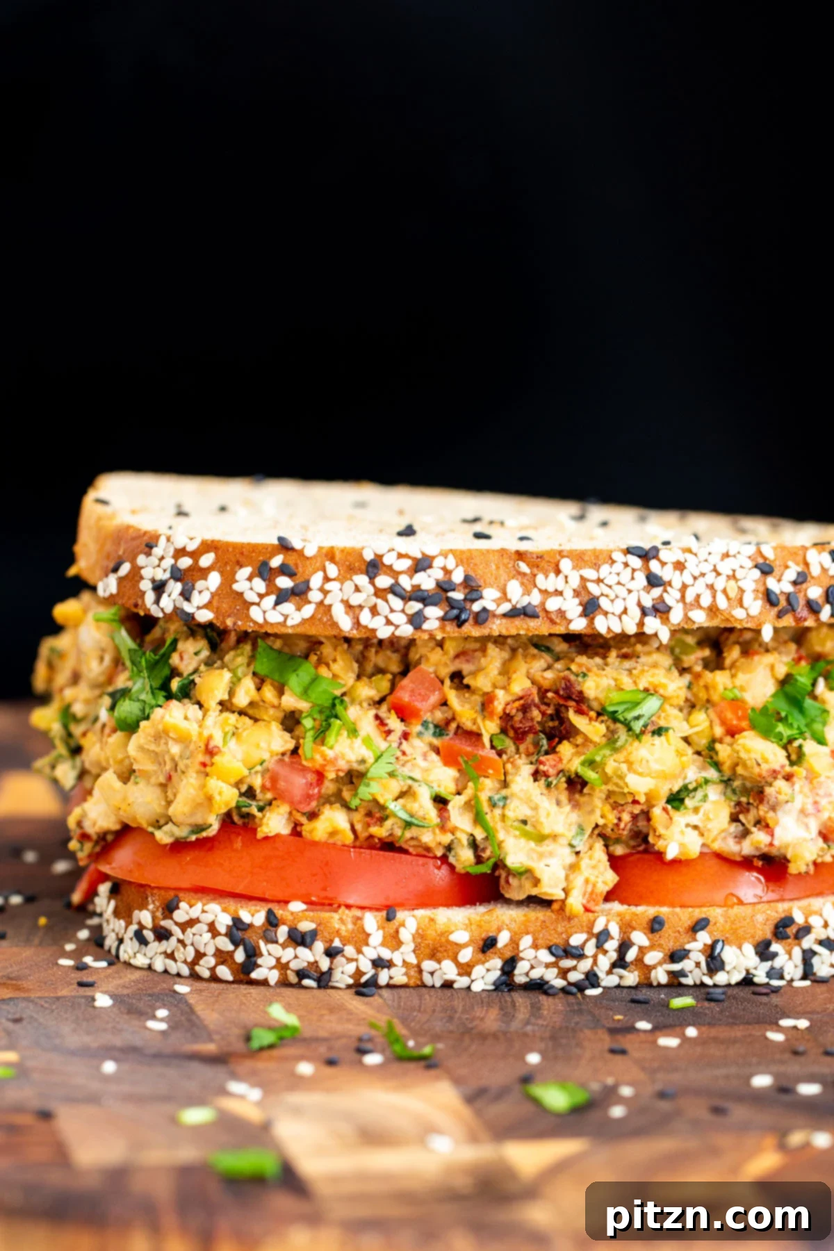 Vibrant Mediterranean Chickpea Sandwich 3 close up side view of vegan Mediterranean chickpea sandwich