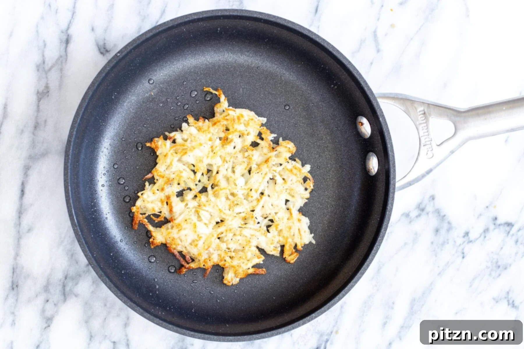 chickpea breakfast vegan hash brown in a sauteeing pan