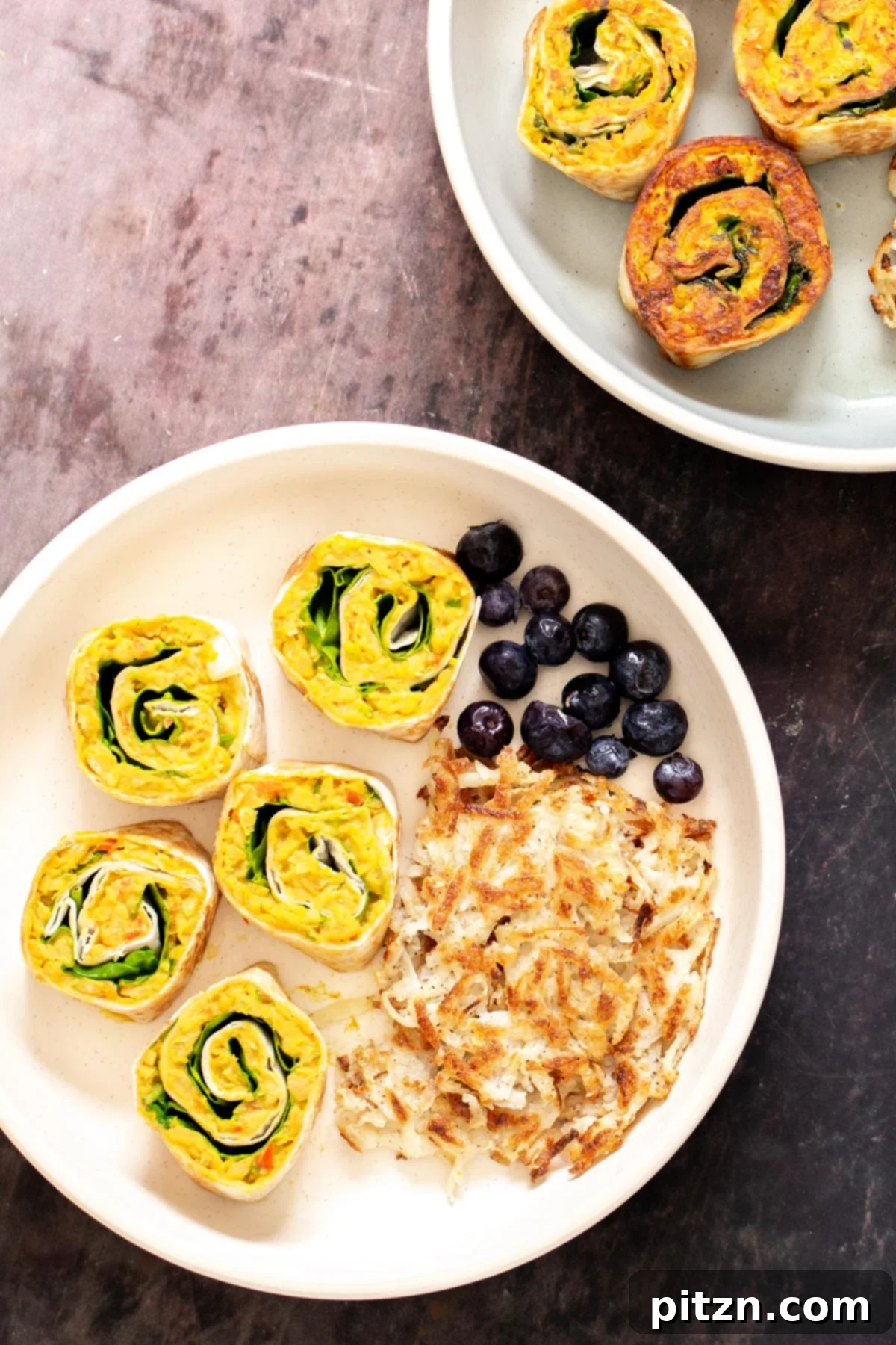chickpea breakfast vegan chickpea breakfast platter with vegan chickpea scramble pinwheels, hash brown and berries