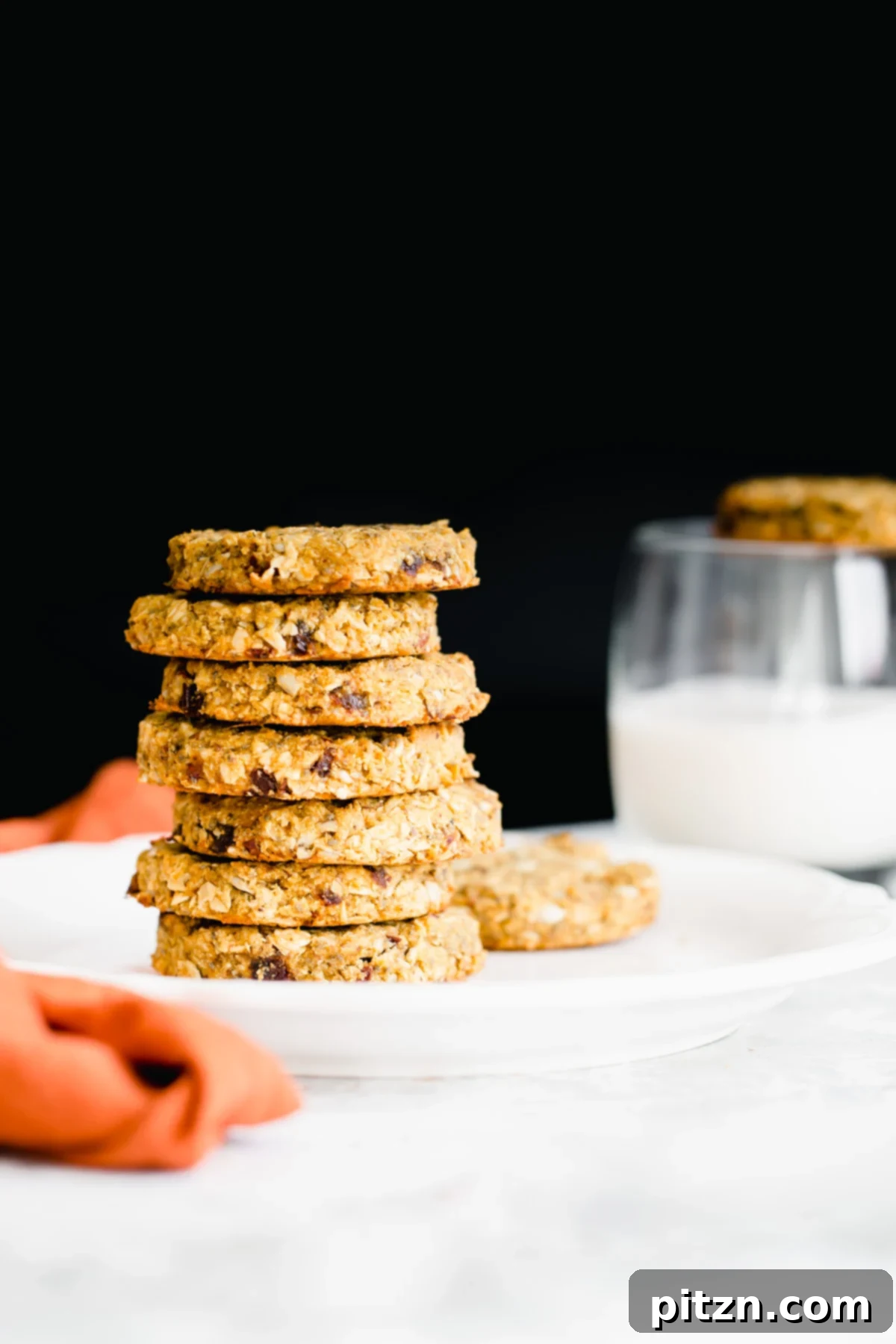 Healthy Pumpkin Breakfast Cookies A beautifully arranged stack of healthy pumpkin breakfast cookies, showcasing their inviting texture and wholesome ingredients.