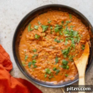 Vegan Keema Madras with lentils on a black skillet