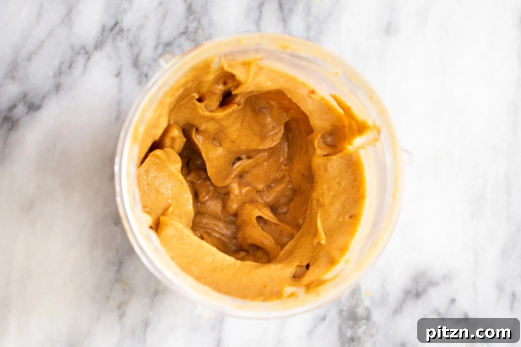 Blended Date Caramel Smooth and creamy date caramel in a blender, perfectly blended and ready to be spread.