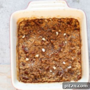 Our Vegan Banana Bread Baked Oatmeal in a white baking dish