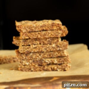a stack of vegan banana nut granola bars with caramelized bananas