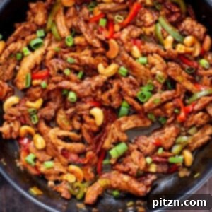 Crispy vegan Dragon Chicken Soycurls with bell peppers and cashews