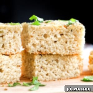 glutenfree focaccia, topped with herbs, garlic and olive oil.