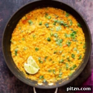 Urad Dal simmering in a skillet, ready to be served