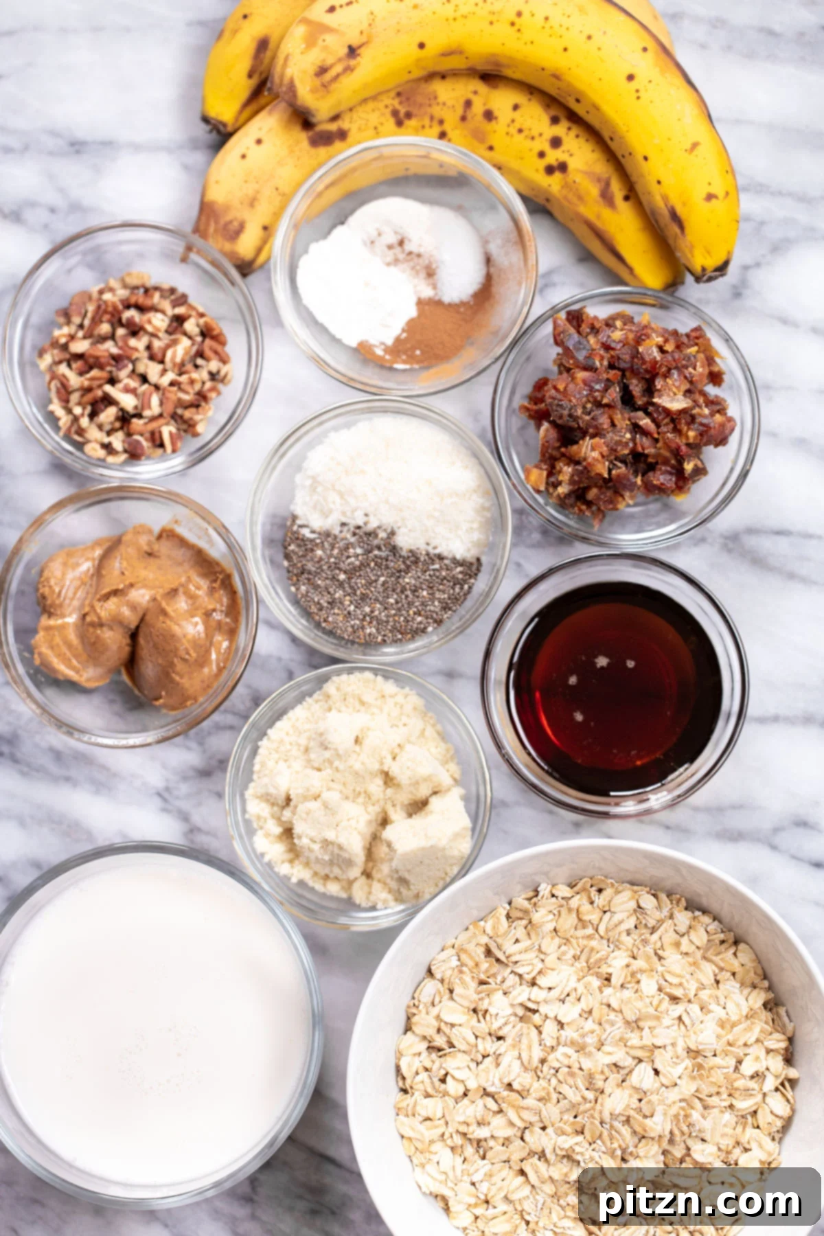 Wholesome Ingredients for Vegan Banana Oatmeal Bars A flat lay photograph showcasing all the individual ingredients laid out for making vegan banana oatmeal bars, emphasizing their natural and wholesome nature.