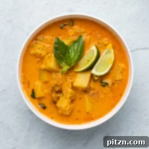 overhead shot of a creamy vegan red lentil sweet potato curry