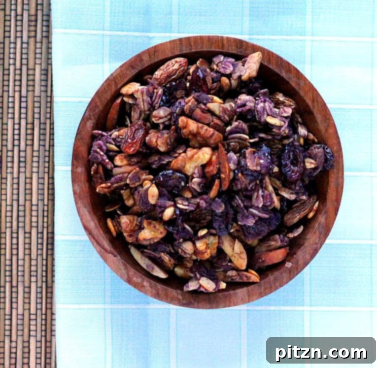 Close-up of mixed dry ingredients for berry granola in a bowl.