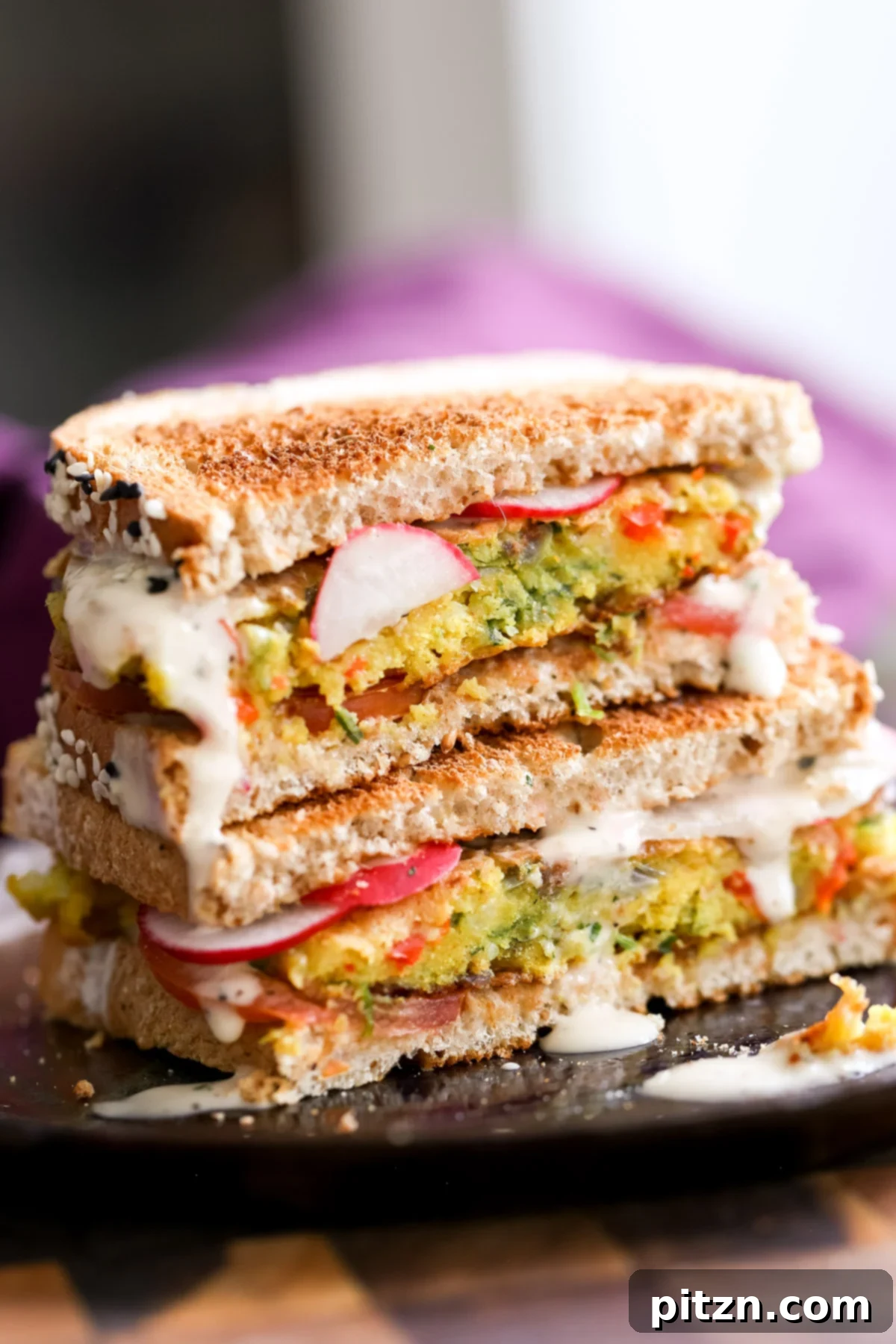 Savory Chickpea Flour Breakfast Combo 18 Close-up of a vibrant vegan breakfast sandwich featuring chickpea flour pancakes and fresh vegetables