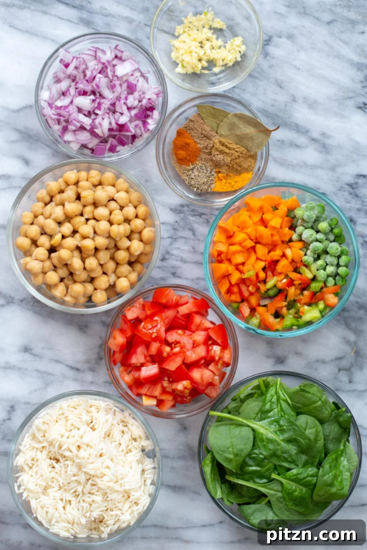 Golden Spiced Vegan Chickpea Rice Bake 6 All the fresh ingredients meticulously arranged, ready for preparing the delicious vegan chickpea rice pulao.