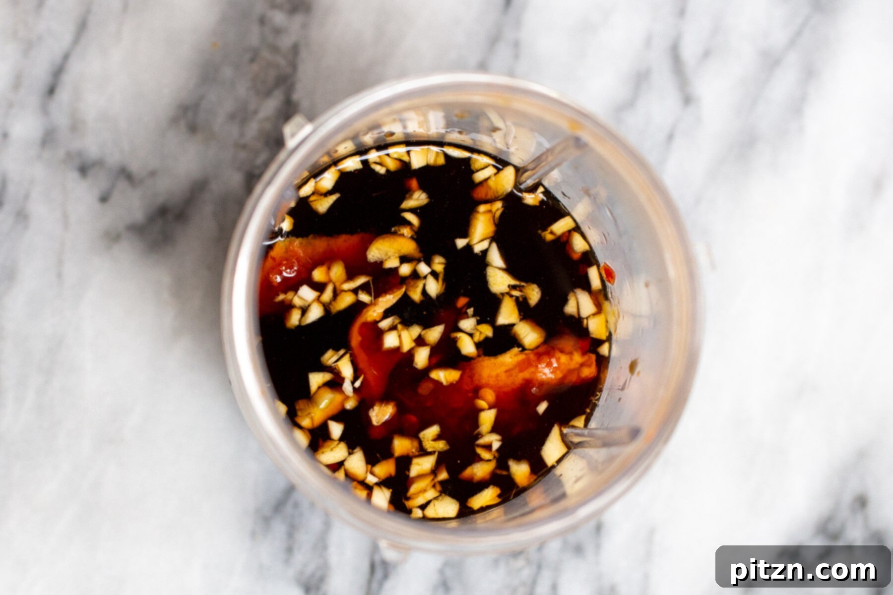 ingredients for stir-fry sauce in a magic bullet 