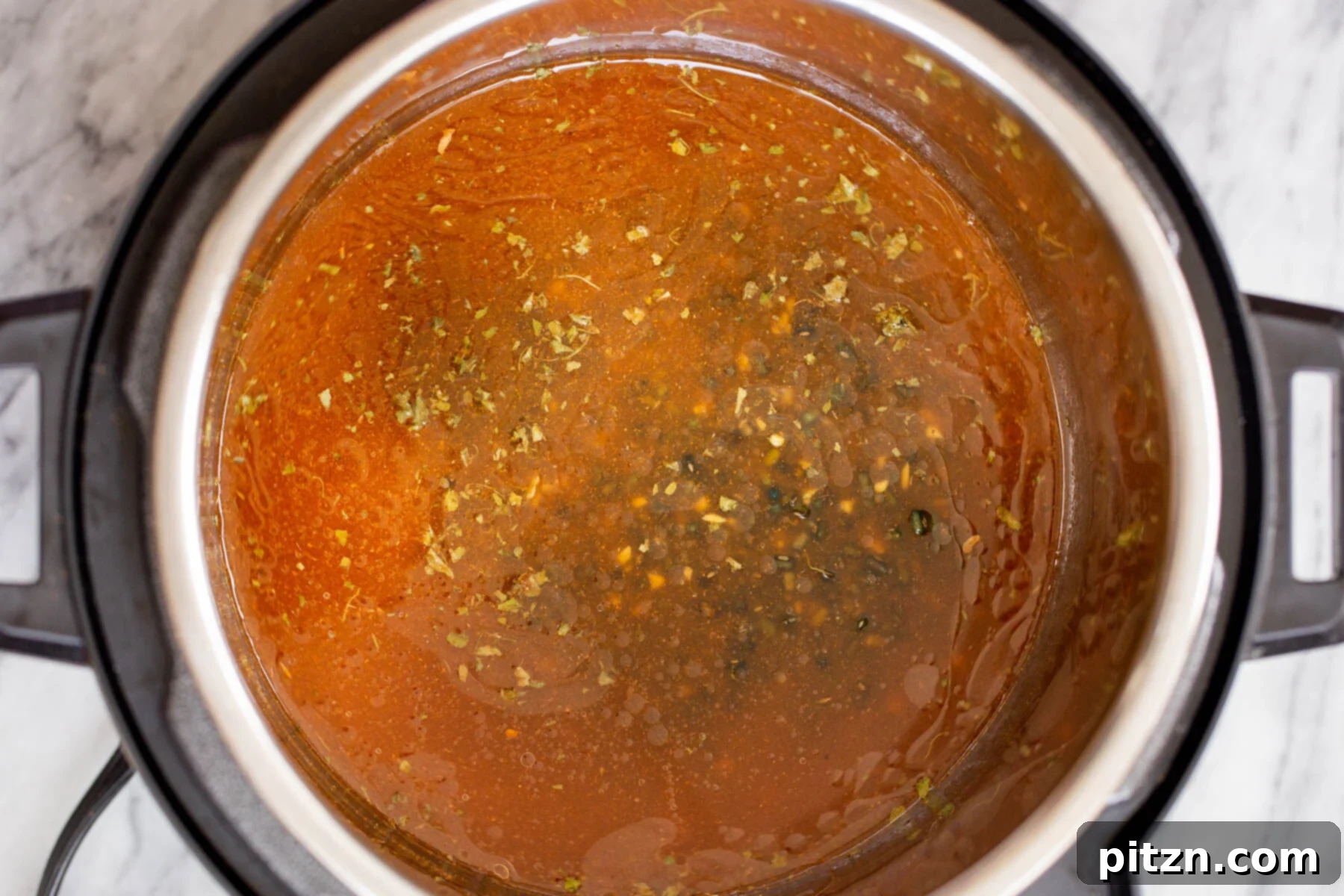 Instant Pot Dal Bukhara - Dump and Done Creamy Black Lentil Perfection 10 Black gram lentils gently cooking with a blend of aromatic spices and rich tomato in an Instant Pot, deepening in flavor.