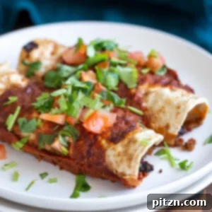 Plant-Powered Enchiladas: Zesty Cauliflower-Bean Filling & Homemade Sauce 5 A vibrant casserole dish of Vegan Enchiladas