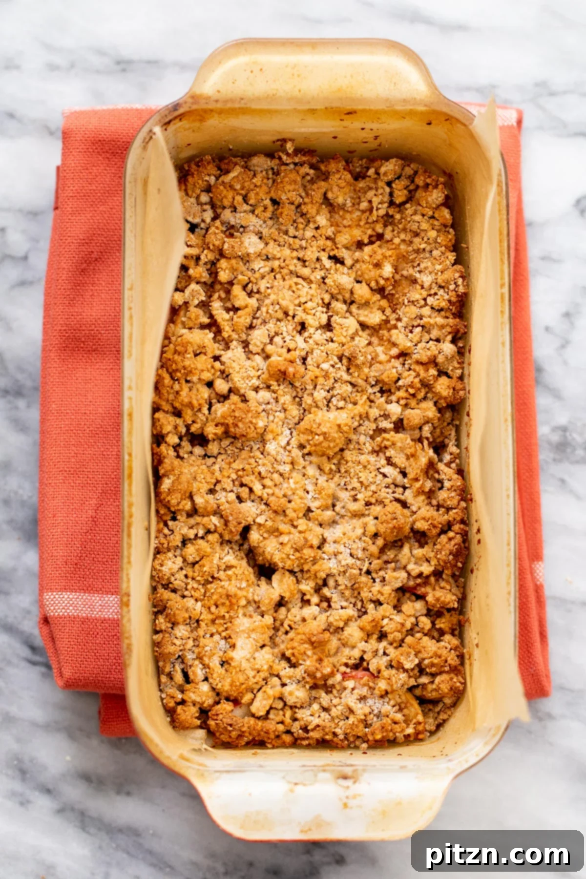 freshly baked vegan apple pie bars on a marble countertop 
