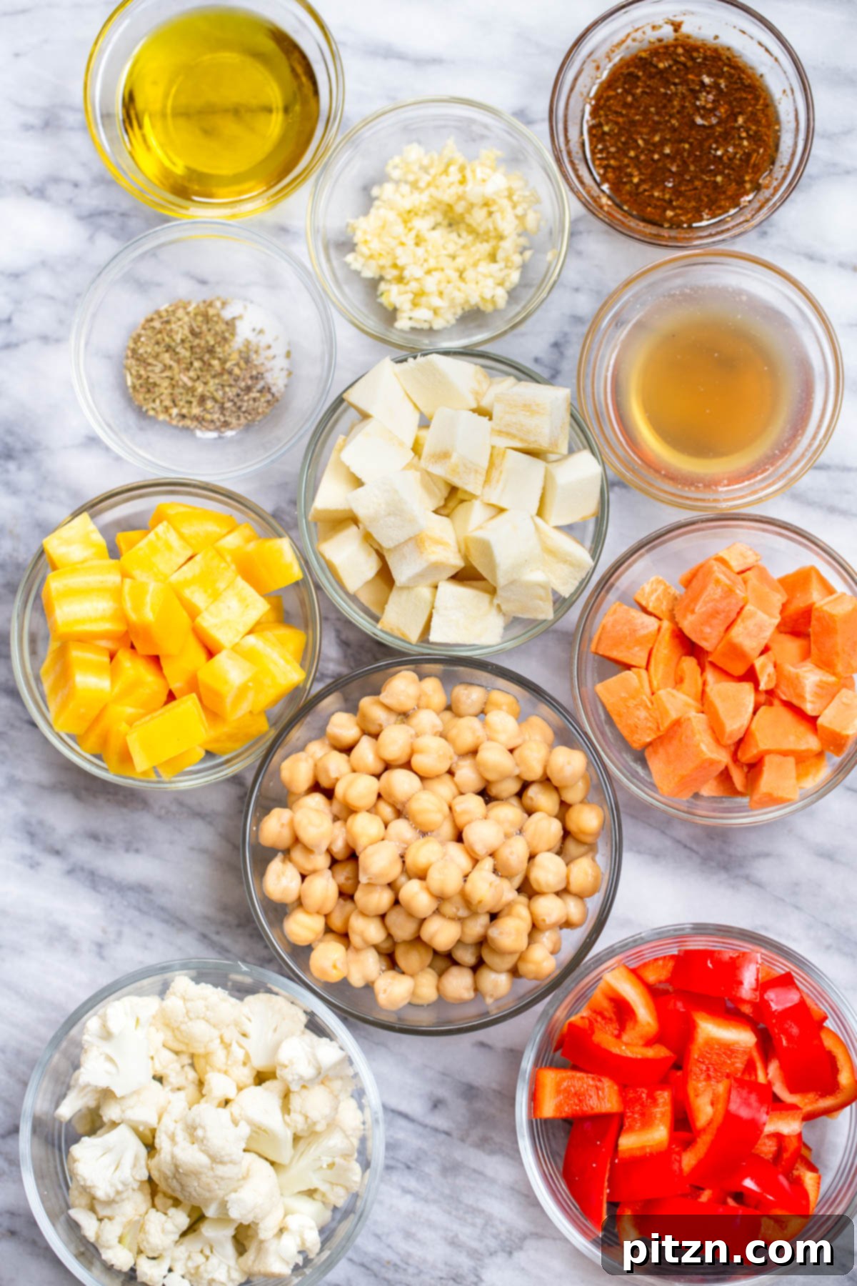 ingredients for roasted root vegetable bowls on a marble countertop