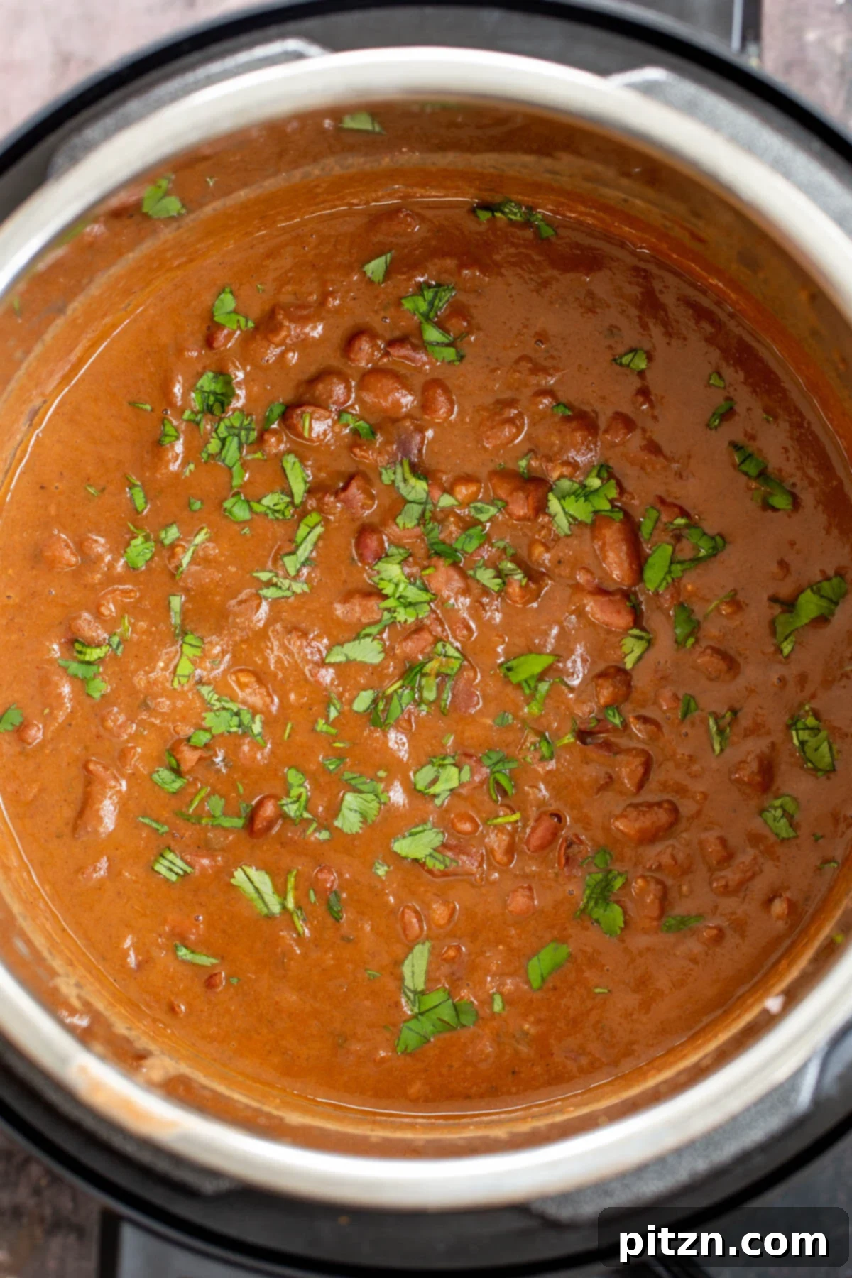 Instant Pot Dhaba Rajma: Authentic & Easy Kidney Bean Curry 4 a close-up of a bowl of Dhaba Style Rajma, showcasing its rich texture and vibrant color