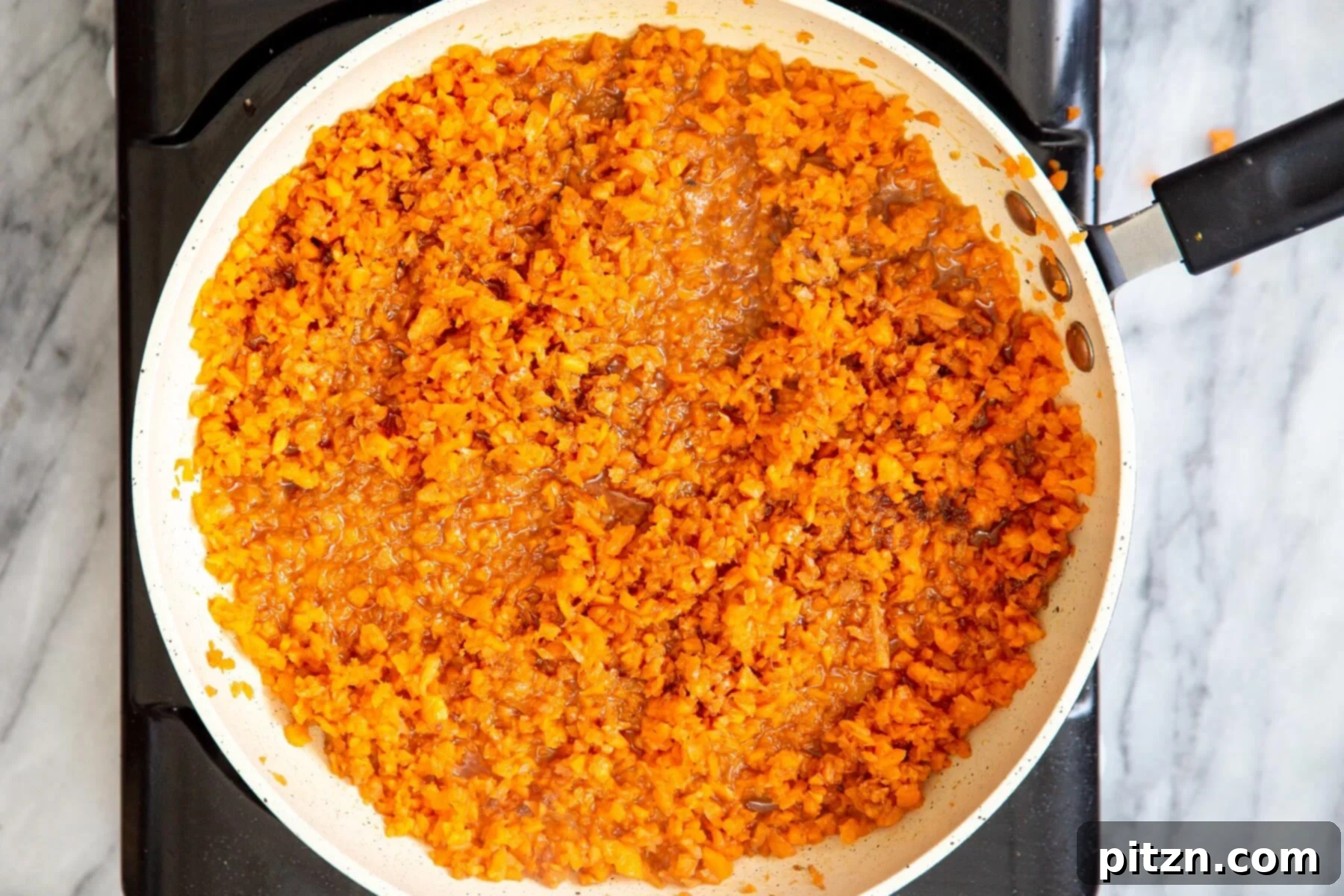 Spiced Vegan Carrot Cake Squares 9 Caramelized carrots in a sautéing pan
