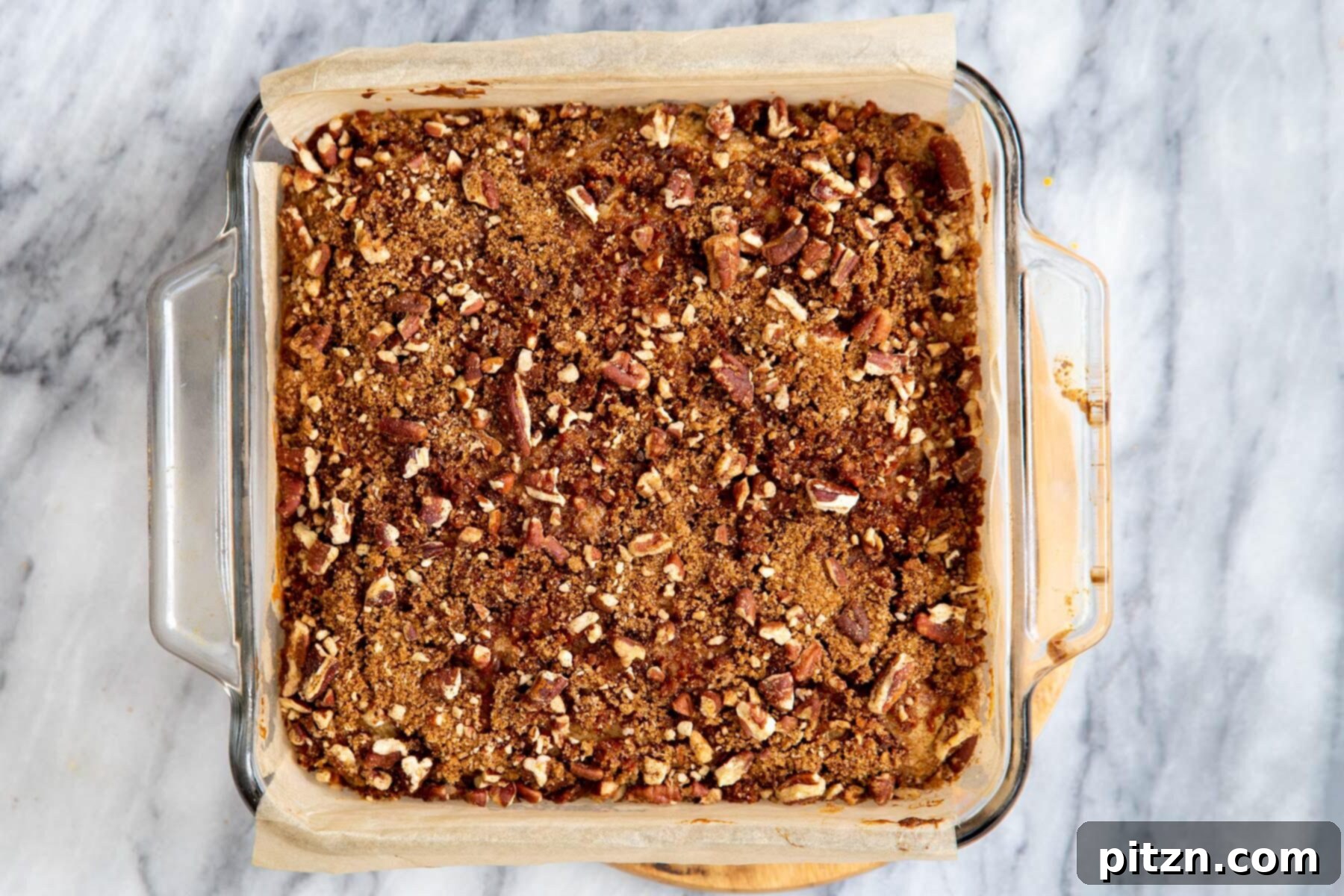 Spiced Vegan Carrot Cake Squares 22 Carrot cake bars with cinnamon sugar streusel in a Pyrex dish