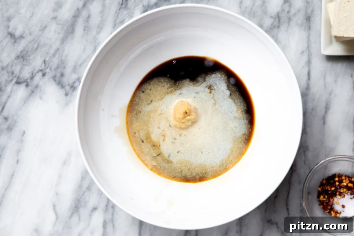 a small bowl with vegan tofu marinade