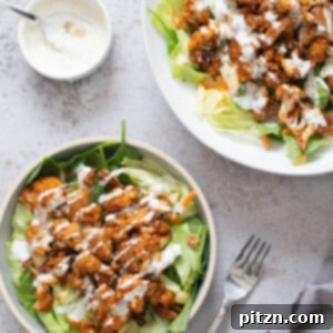 bbq roasted cauliflower salad bowl drizzled with Vegan Ranch Dressing