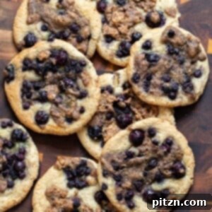 Gluten-Free Vegan Blueberry Muffin Cookies 5 Freshly baked Blueberry Muffin Almond Flour Cookies ready to be served. Vegan and Gluten-Free.