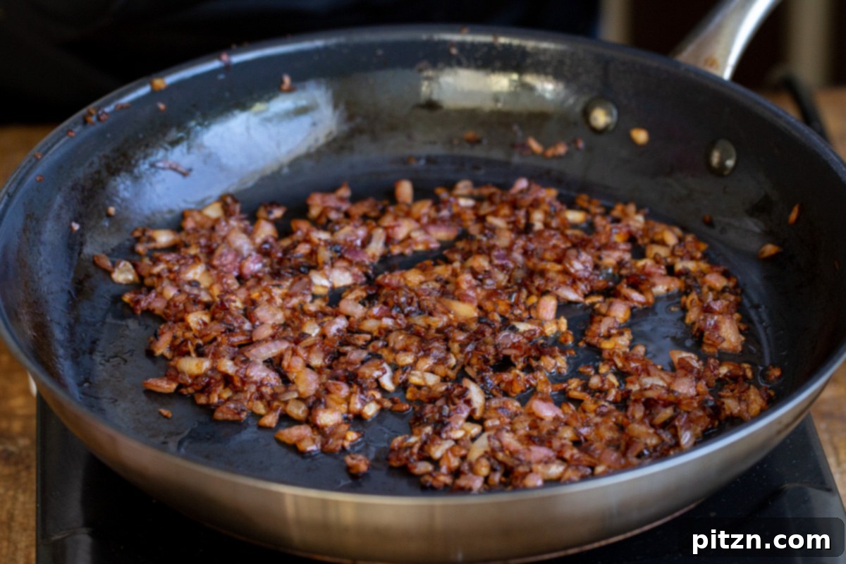 browned onions in a black skillet 