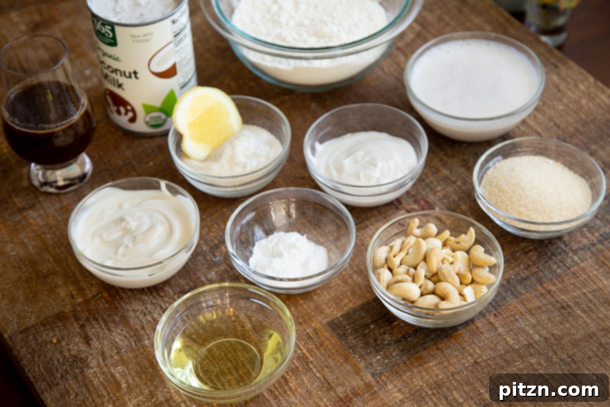 Plant-Based Tiramisu Tray Bake 7 A collection of ingredients meticulously laid out, ready for making the vegan tiramisu sheet cake, showcasing fresh and pantry staples.