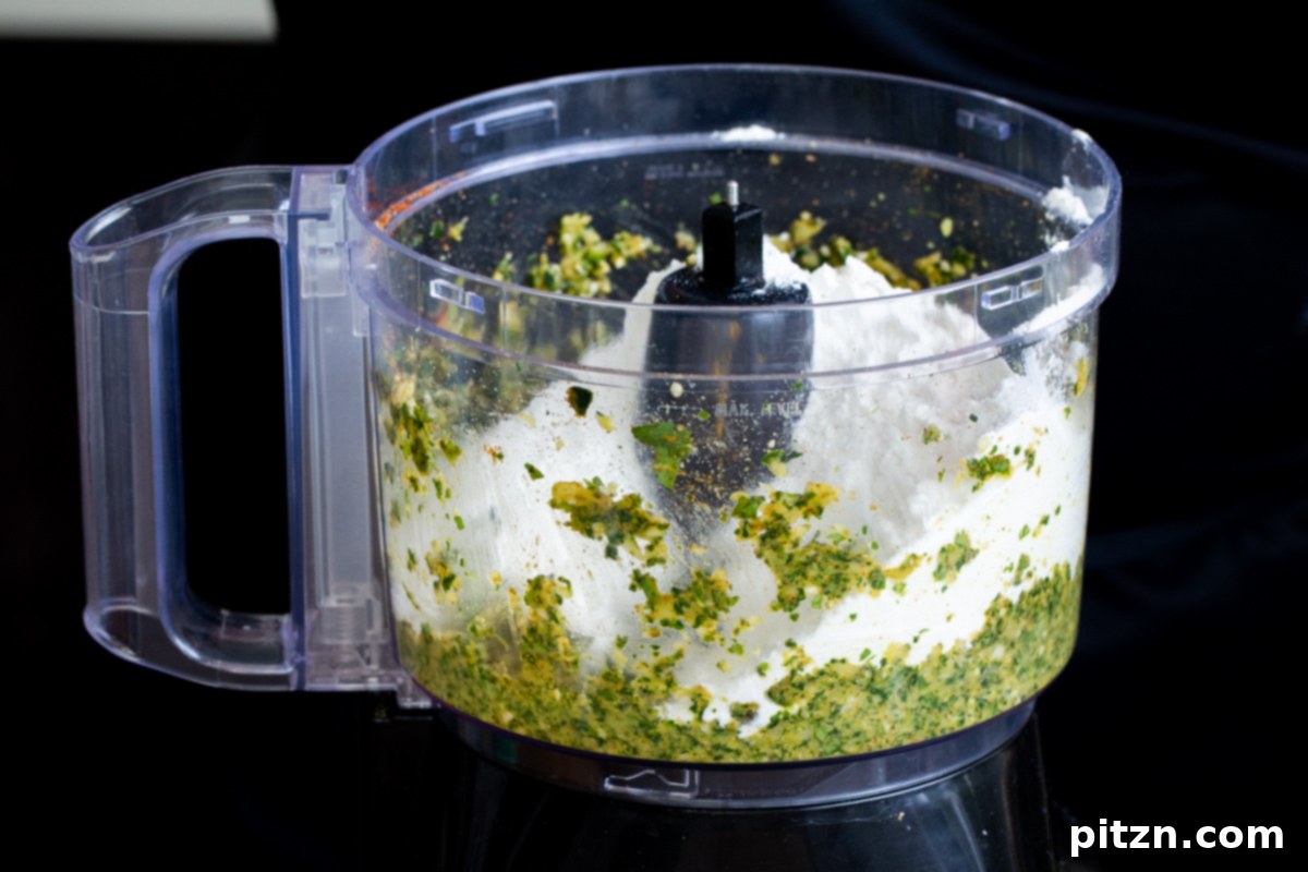 Aromatic Masala Paratha: Easy Yeast-Free Indian Flatbread 7 flour and chopped veggies in a food processor container