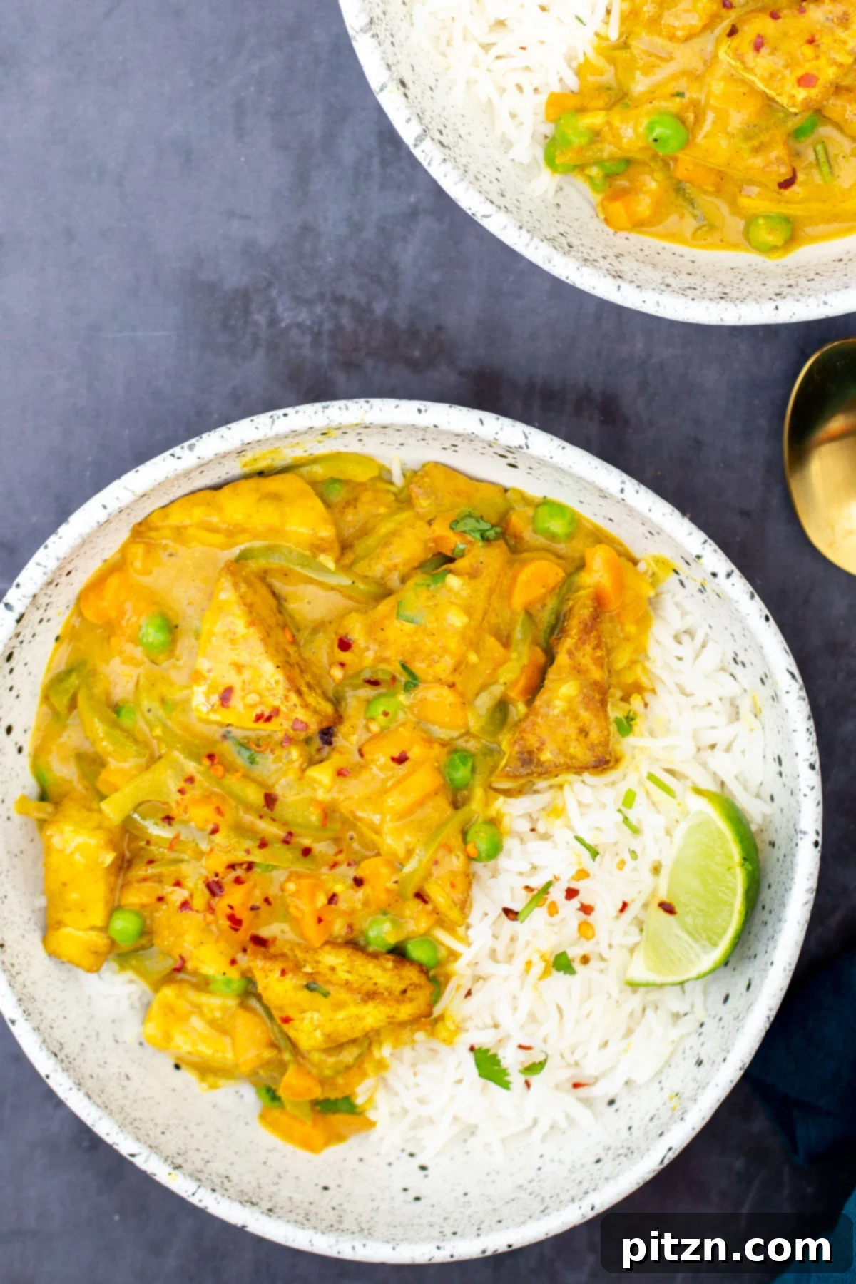 Vibrant Malaysian Tofu Curry 4 Malaysian Coconut curry with crispy tofu served with a side of rice