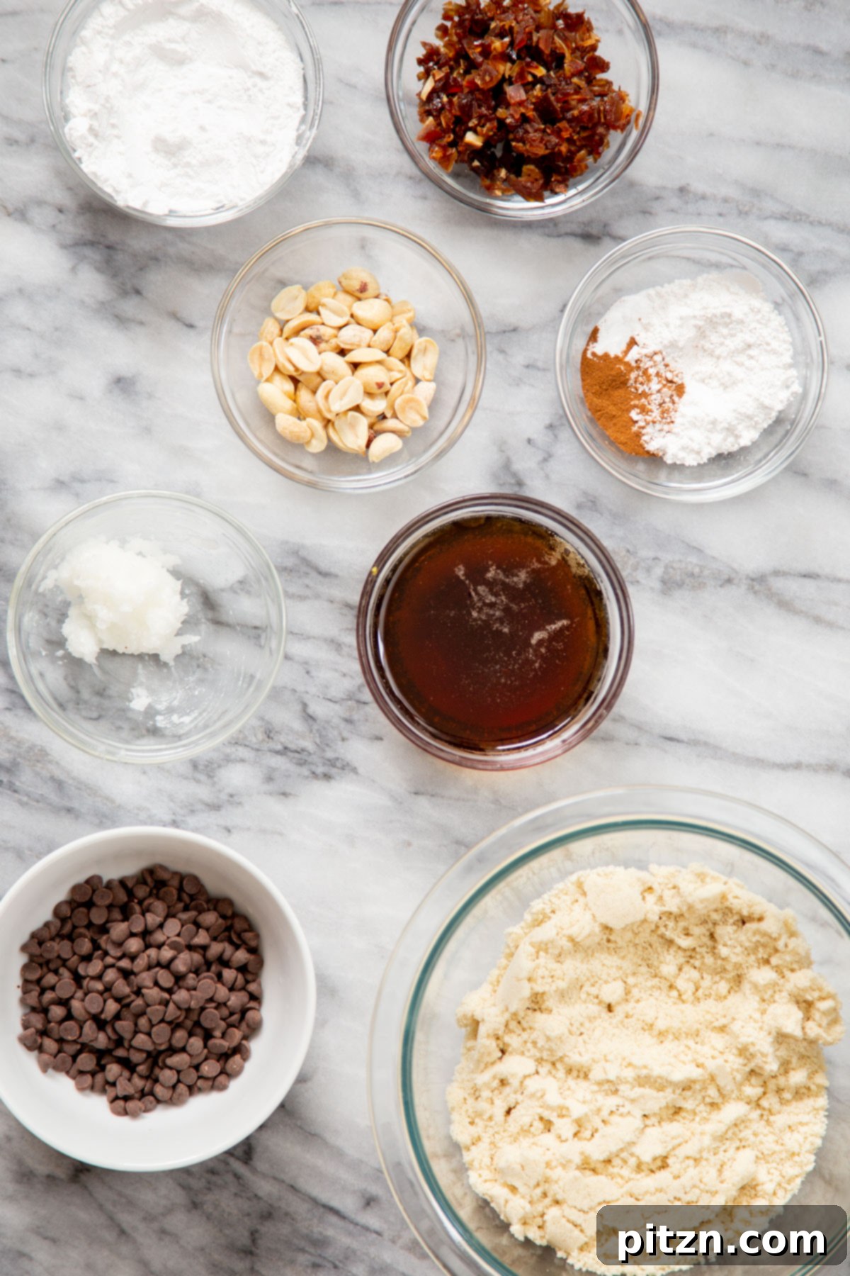 The Ultimate Vegan Gluten-Free Snickers Cookies 6 All the essential ingredients neatly laid out for making vegan gluten-free Snickers cookies, ready for baking.