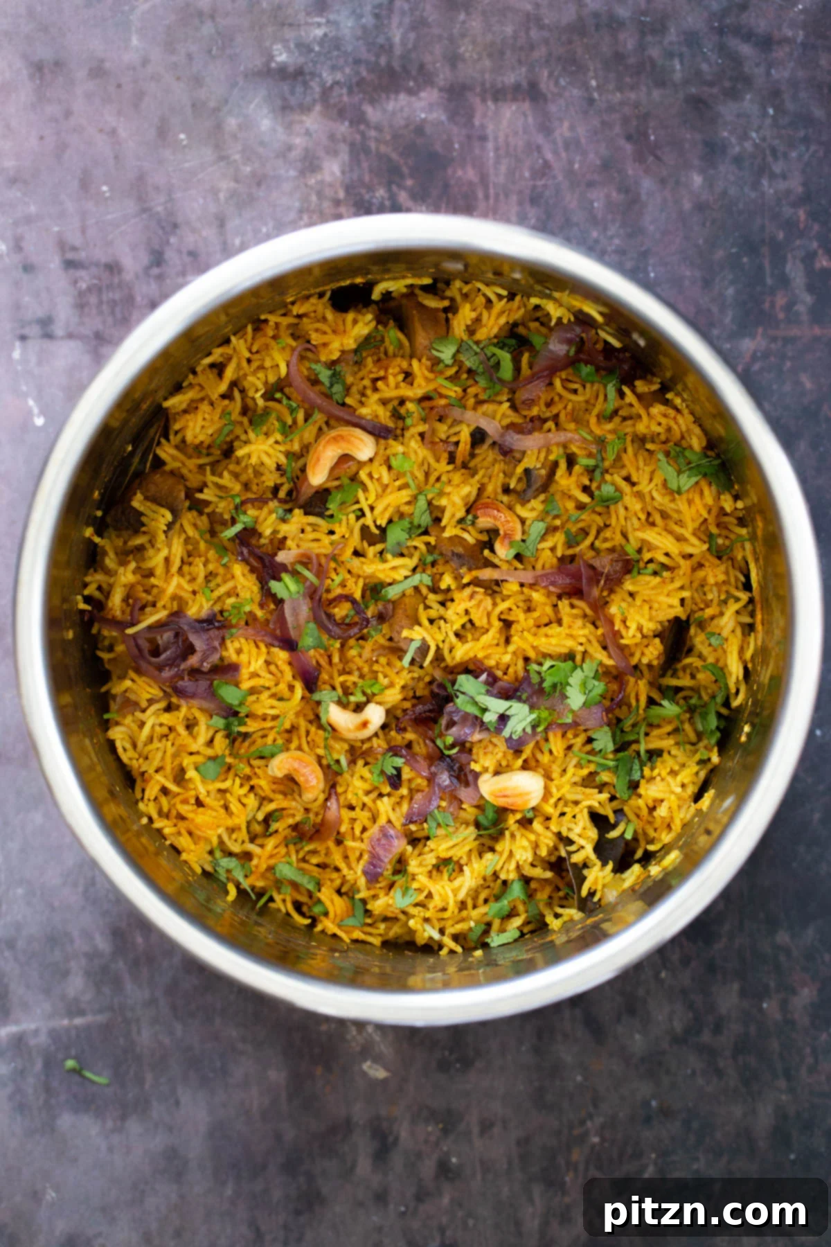 Fragrant Mushroom Biryani 23 A vibrant and aromatic serving of vegan mushroom biryani, freshly prepared in an Instant Pot, ready to delight.