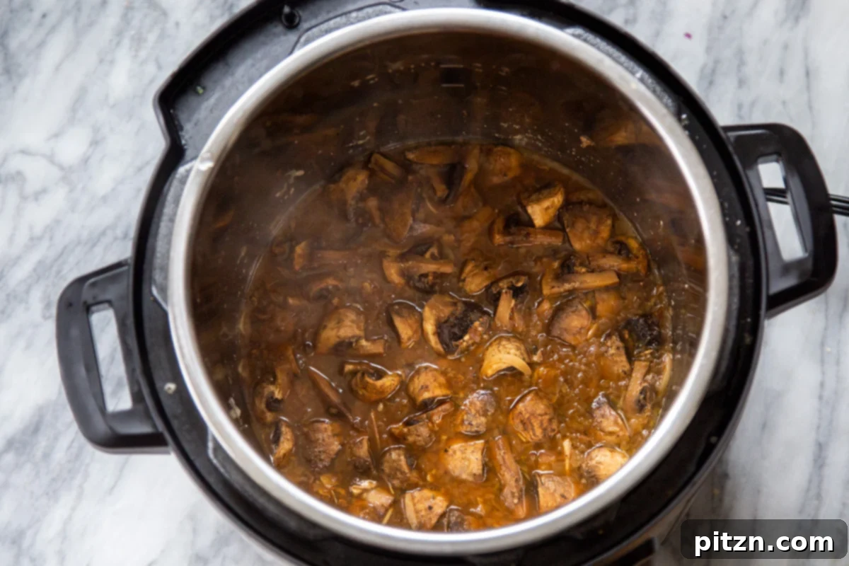 garlic mushrooms sautéing in an Instant Pot 