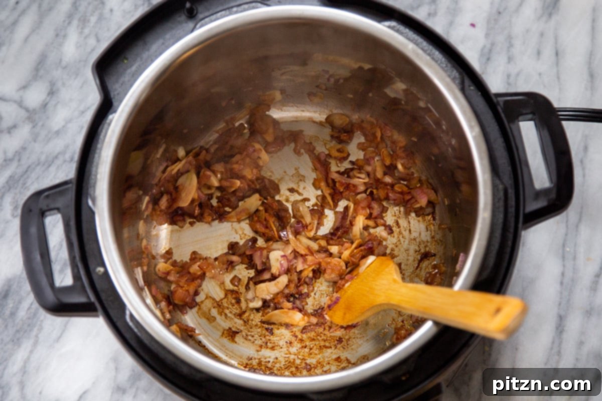 browned onion and garlic in an Instant Pot 