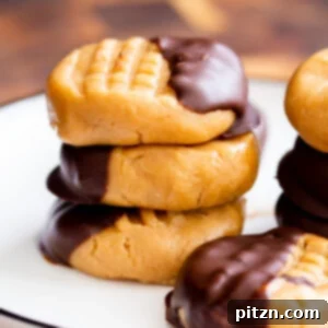 A stack of no bake peanut butter cookies dipped in chocolate on a plate