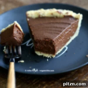 A decadent Vegan Chocolate Pumpkin Pie, offering a rich twist on a classic dessert.