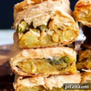 A savory Vegan Samosa Pie, a giant veggie samosa in pie form, perfect for holidays and parties.