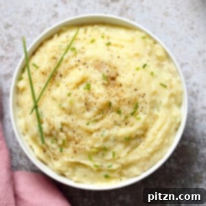 Easy Vegan Mashed Potatoes, fluffy and creamy, ready to be served with gravy or as a delightful side dish. Can be made in an Instant Pot.