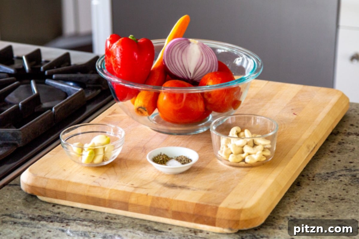 Velvet Roasted Tomato Bliss 7 A selection of fresh ingredients for roasted tomato soup, including tomatoes, garlic, onions, and herbs, arranged on a rustic wooden board.