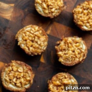 Mini Apple Pie Cheesecake Delights 5 A top-down view of vegan mini apple pie cheesecakes, perfectly baked and garnished