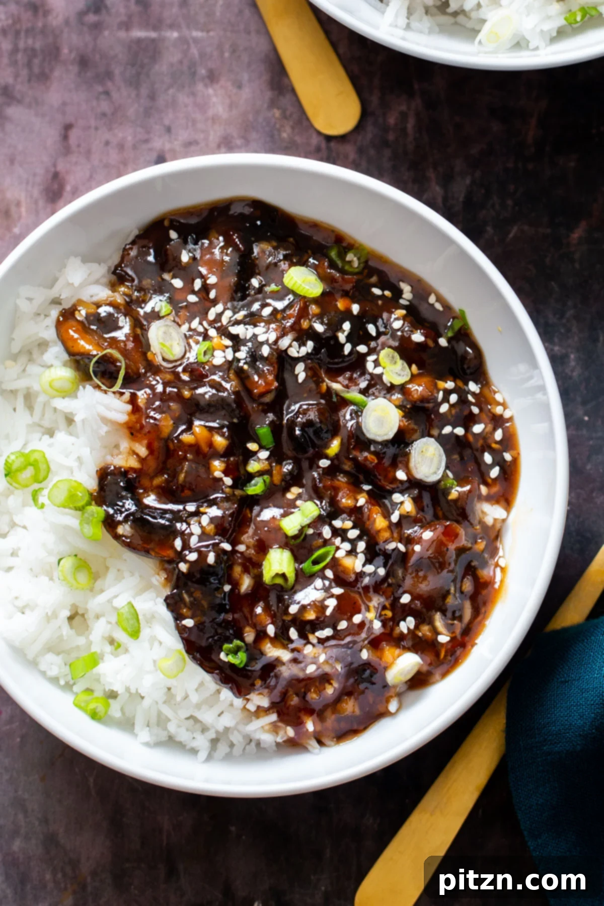 Sesame Glazed Mushrooms 15 Sticky sesame mushrooms served with rice and sprinkled with sesame seeds and green onions